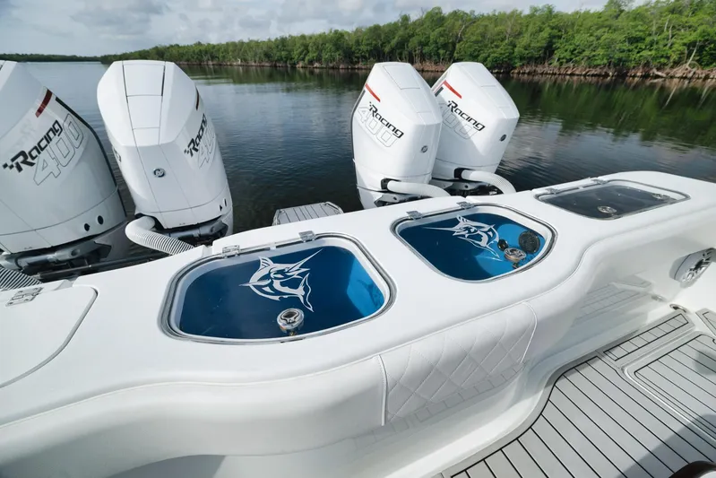  Yacht Photos Pics Freeman 47 boat with quad Racing 400 engines, 2022 model, on calm water.