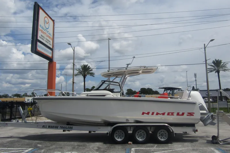  Yacht Photos Pics 2024 Nimbus T8 boat on trailer at Nautical Ventures dealership.