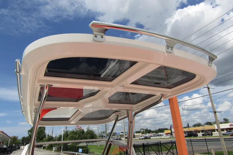  Yacht Photos Pics 2024 Nimbus T8 boat canopy with sleek design and sturdy metal supports.