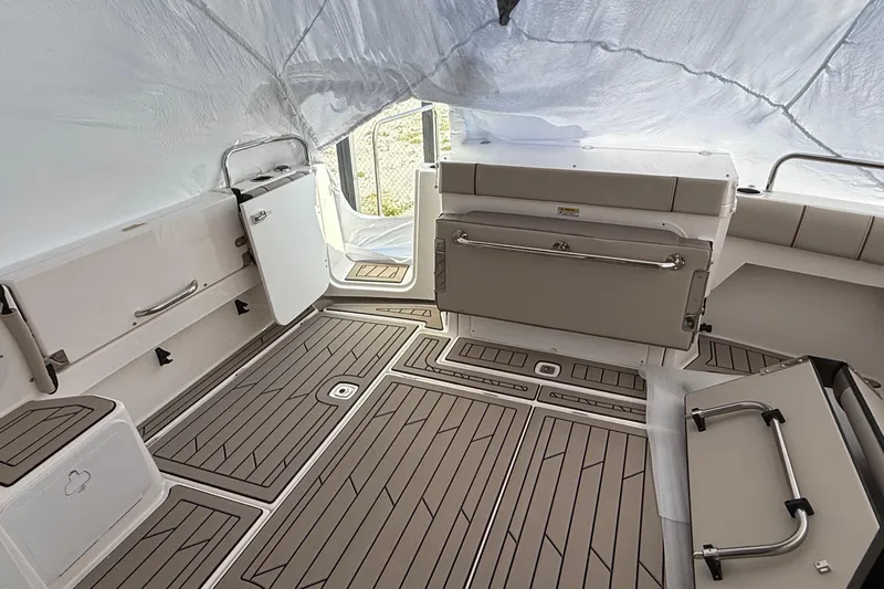  Yacht Photos Pics 2025 Cutwater C-32 CB boat interior with sleek, modern design and spacious deck layout.