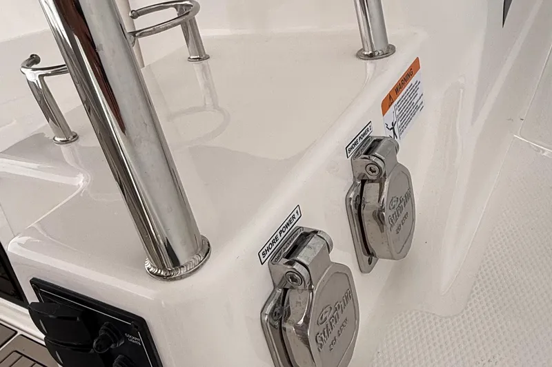  Yacht Photos Pics 2025 Cutwater C-32 CB boat with shore power connections and stainless steel fixtures.