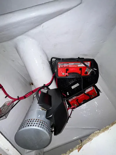 Carisa Yacht Photos Pics Battery compartment of a 2001 Viking 55 Convertible boat with red wiring.