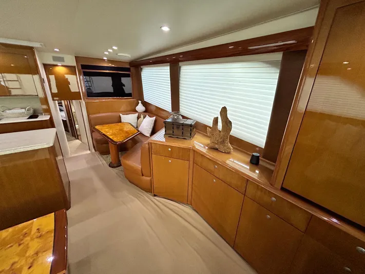 Carisa Yacht Photos Pics Luxurious interior of 2001 Viking 55 Convertible yacht with elegant wood finishes.
