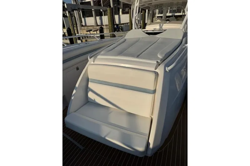  Yacht Photos Pics 2016 Intrepid 475 Panacea boat with sleek white seating and deck.