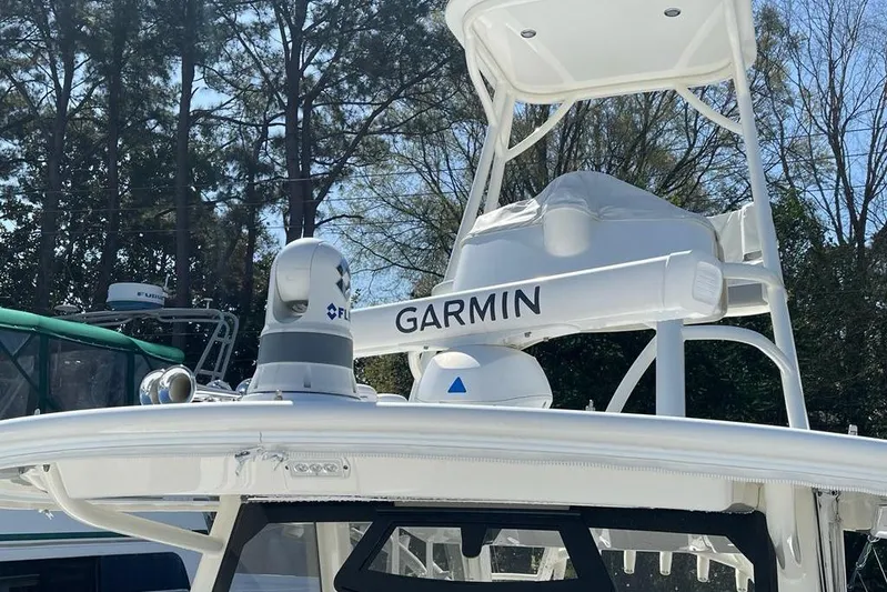  Yacht Photos Pics 2019 Regulator 41 boat with Garmin radar and FLIR camera, surrounded by trees.