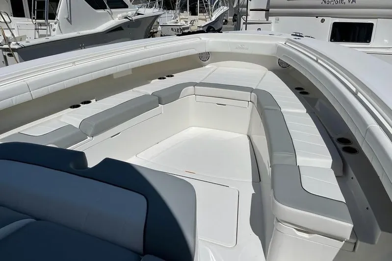  Yacht Photos Pics Luxurious seating area on a 2019 Regulator 41 boat, featuring sleek white and gray upholstery.