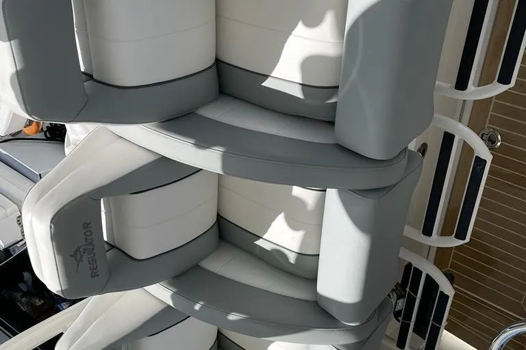  Yacht Photos Pics 2019 Regulator 41 boat seating with gray and white cushions, showcasing luxury marine design.