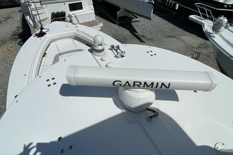  Yacht Photos Pics 2019 Regulator 41 boat with Garmin radar on deck, docked in a marina.
