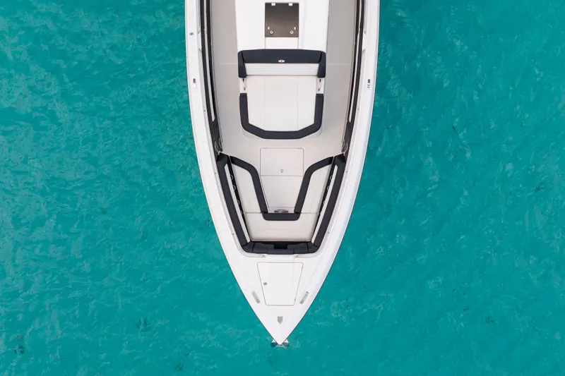  Yacht Photos Pics Top view of 2025 Cigarette 42 Auroris boat on turquoise water.