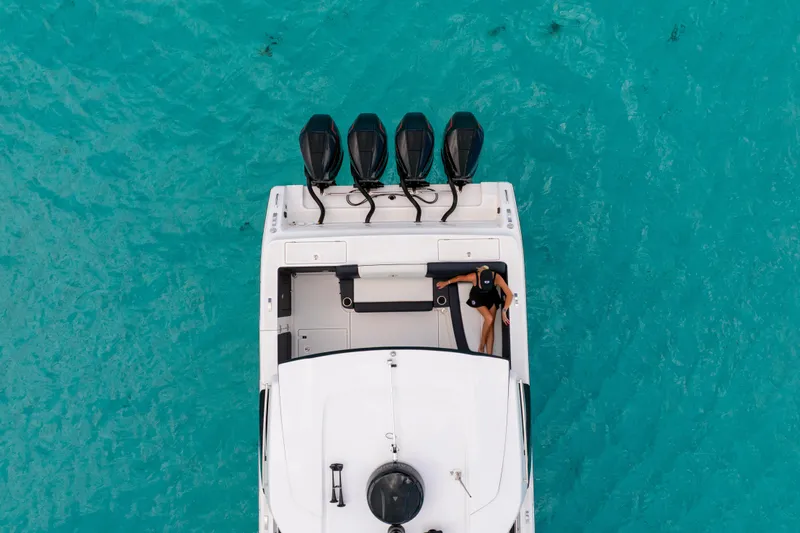  Yacht Photos Pics Aerial view of 2025 Cigarette 42 Auroris boat on turquoise water.