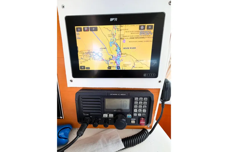 No Ka Oi Yacht Photos Pics Navigation system and radio on a 2005 Lagoon 380 S2 catamaran.