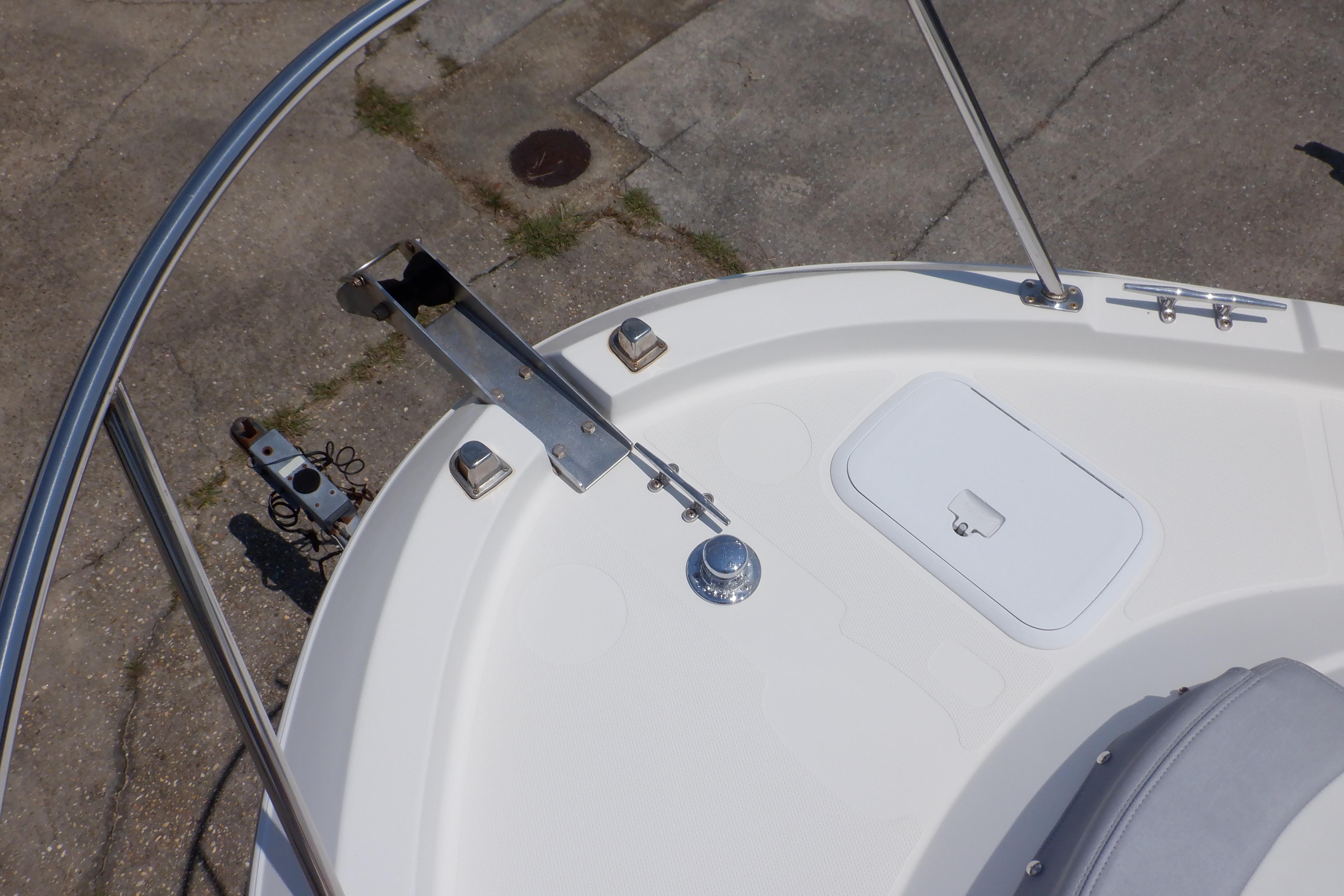 2015 Seaswirl Striper 220 Walkaround boat deck with anchor holder and hatch.