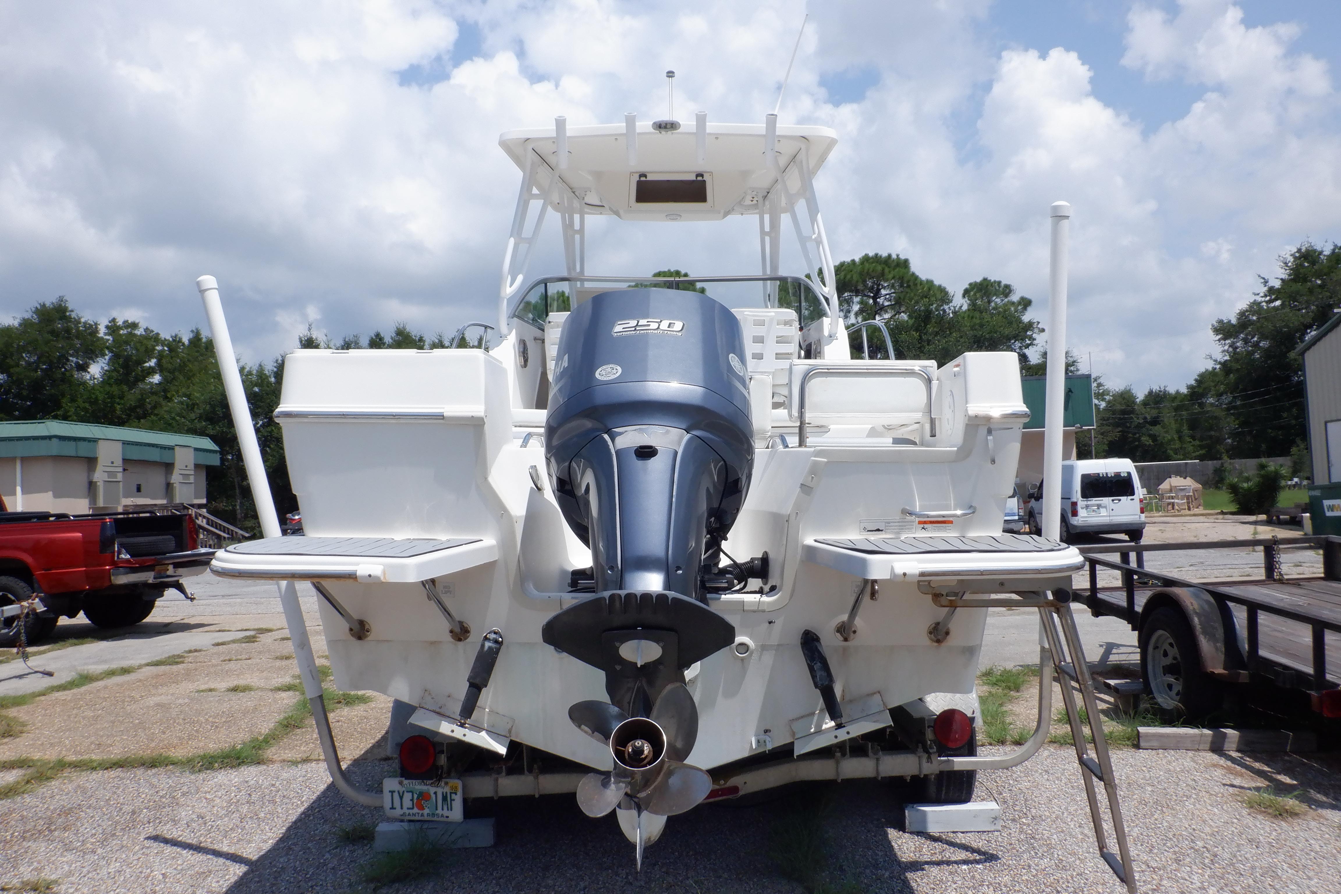 2015 Seaswirl Striper 220 Walkaround boat with Yamaha 250 outboard motor, rear view.