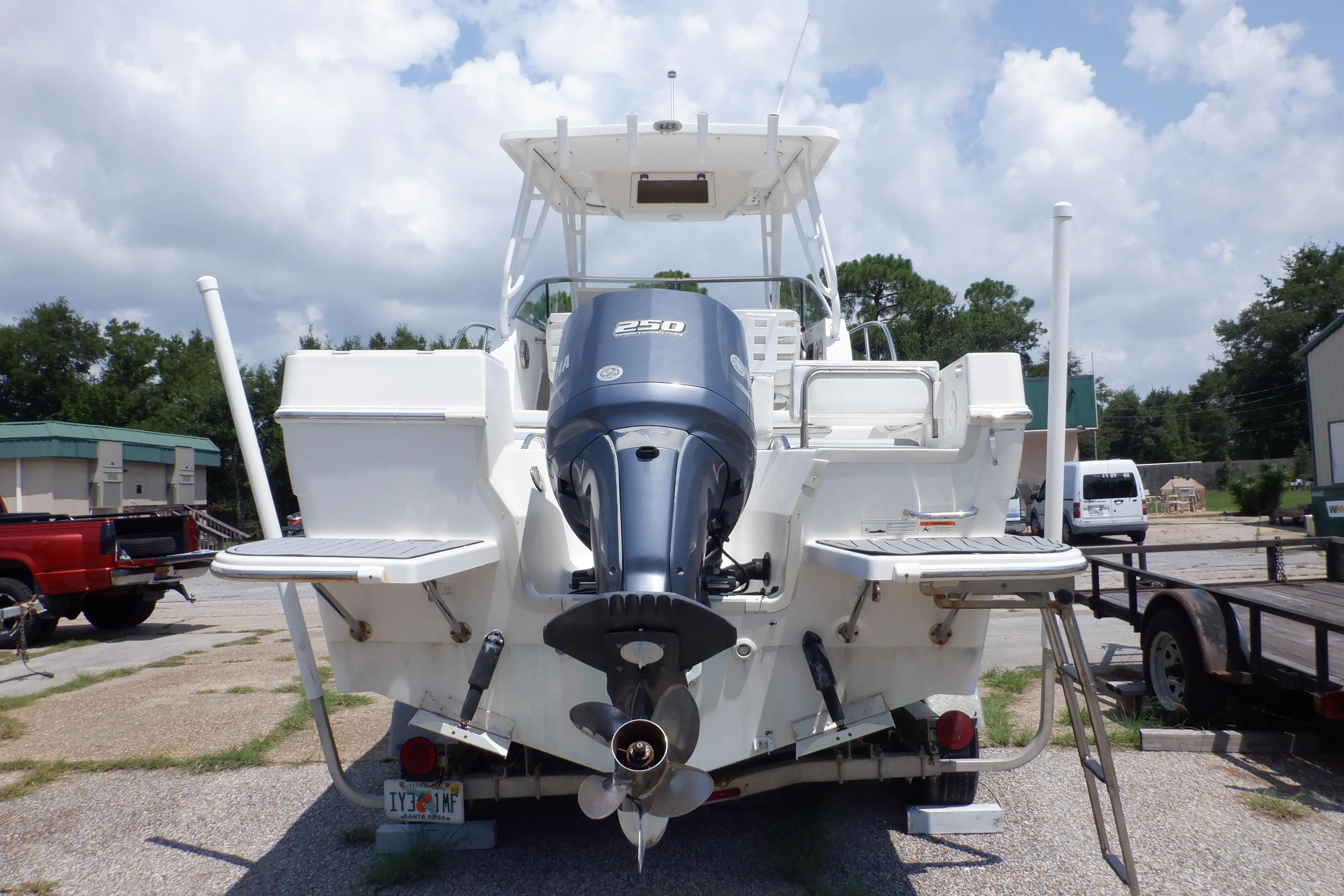 2015 Seaswirl Striper 220 Walkaround boat with Yamaha 250 outboard motor, rear view.