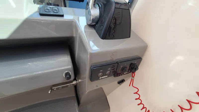  Yacht Photos Pics Control panel of a 2016 Pursuit DC 325 Dual Console boat, featuring Yamaha controls.