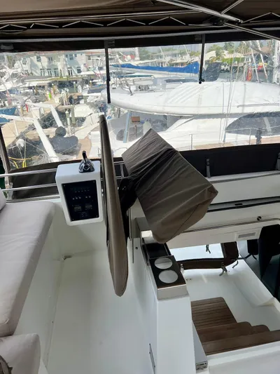  Yacht Photos Pics 2017 Lagoon 620 yacht helm station with marina view in the background.