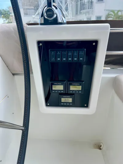  Yacht Photos Pics Control panel of a 2017 Lagoon 620 yacht with digital displays and switches.
