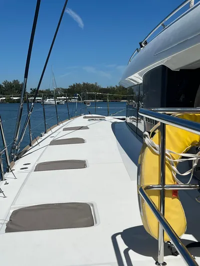  Yacht Photos Pics 2017 Lagoon 620 yacht deck with sunny weather and ocean view.