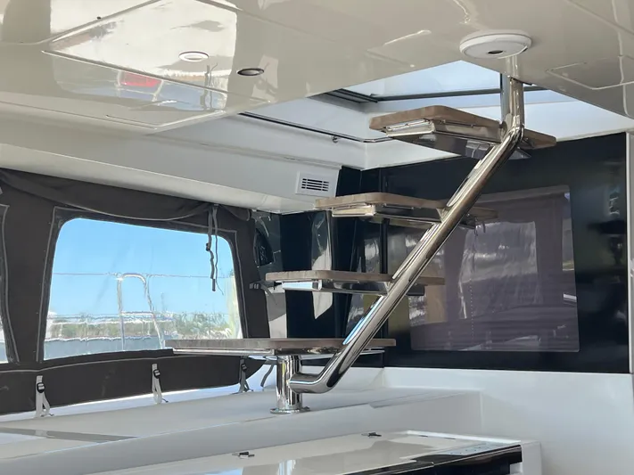  Yacht Photos Pics Modern interior of 2017 Lagoon 620 yacht with sleek staircase design.