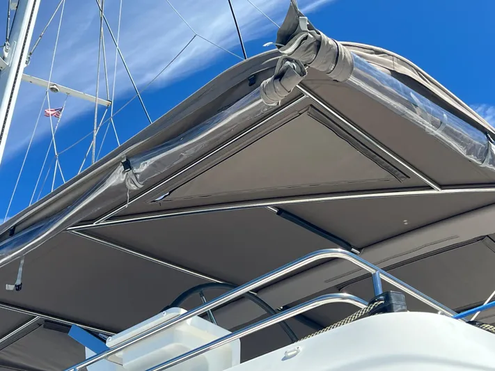  Yacht Photos Pics Lagoon 620 yacht canopy, 2017 model, with sleek design against a clear blue sky.