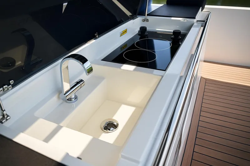  Yacht Photos Pics Luxury yacht kitchen with sink and stove, De Antonio Yachts D42, 2021 model.