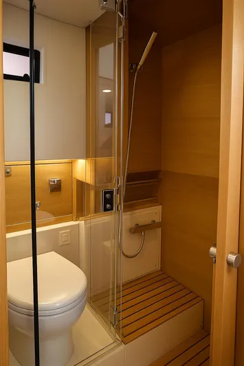  Yacht Photos Pics Modern bathroom in 2021 De Antonio Yachts D42, featuring sleek shower and toilet design.