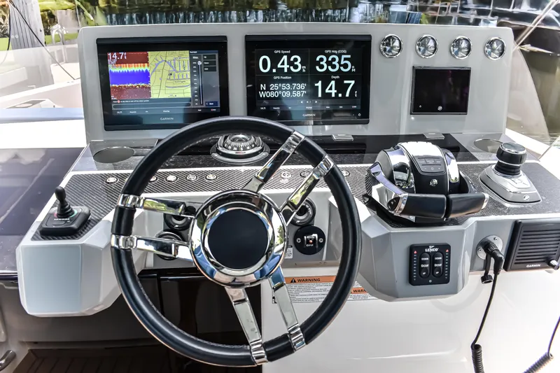  Yacht Photos Pics Helm of 2021 De Antonio Yachts D42 with advanced navigation displays and controls.