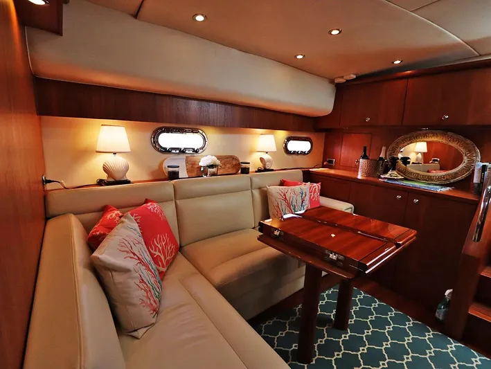 Ocho Yacht Photos Pics Luxurious interior of 2009 Tiara Yachts 4300 Sovran with elegant seating and decor.