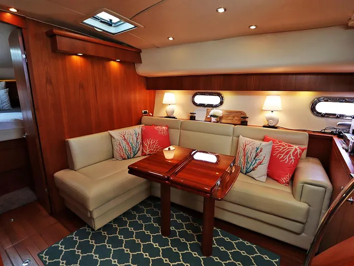 Ocho Yacht Photos Pics Luxurious interior of 2009 Tiara Yachts 4300 Sovran with elegant seating and decor.