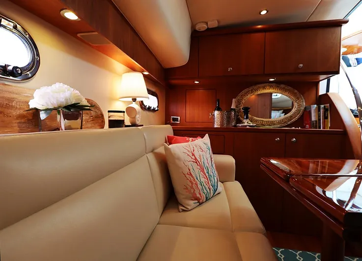 Ocho Yacht Photos Pics Luxurious interior of 2009 Tiara Yachts 4300 Sovran with elegant seating and decor.