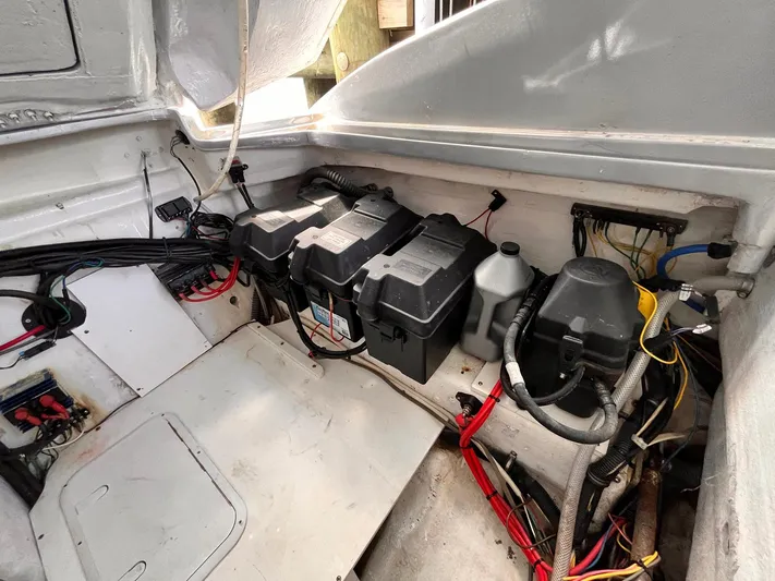  Yacht Photos Pics Engine compartment of a 2011 Statement 380 Open boat, showing batteries and wiring.
