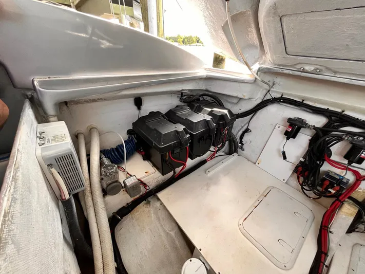  Yacht Photos Pics Engine compartment of 2011 Statement 380 Open boat with batteries and wiring.