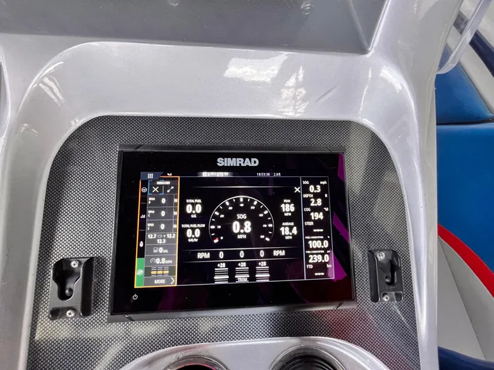  Yacht Photos Pics Simrad display on 2011 Statement 380 Open boat dashboard showing navigation and engine data.