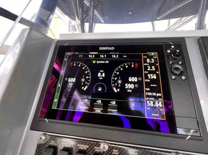  Yacht Photos Pics Simrad display on 2011 Statement 380 Open boat showing engine metrics and system status.