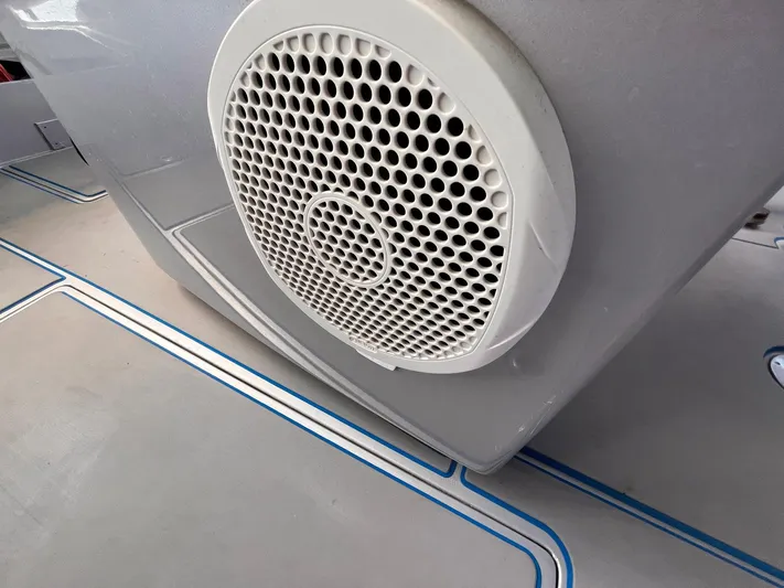  Yacht Photos Pics Speaker on a 2011 Statement 380 Open boat with blue-lined flooring.