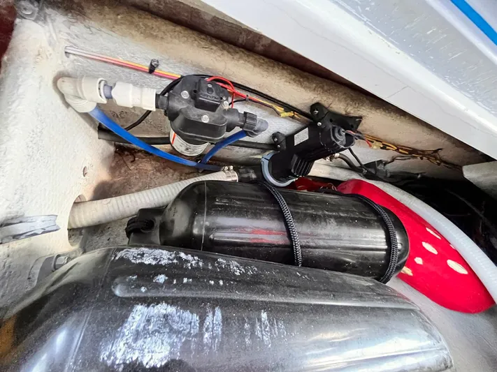  Yacht Photos Pics Engine compartment of a 2011 Statement 380 Open boat, showing hoses and components.