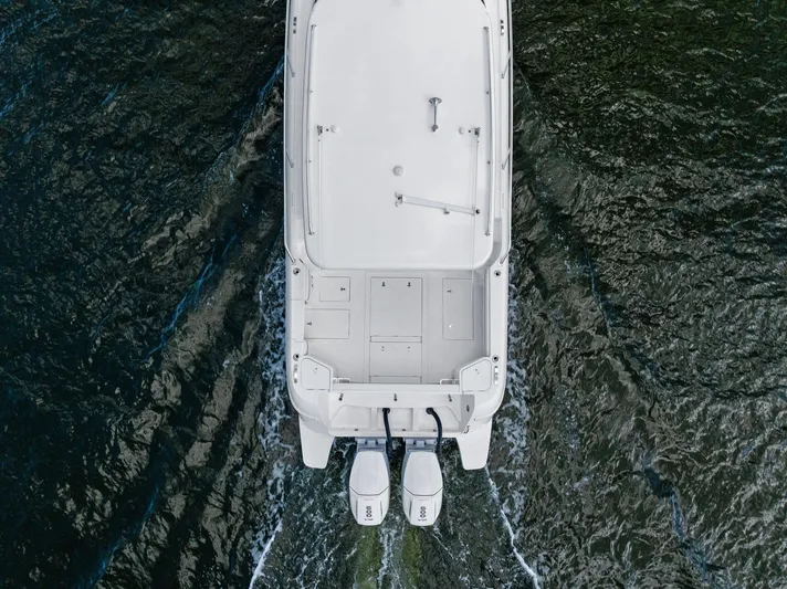 Tide Chaser Yacht Photos Pics Aerial view of 2022 Intrepid 438 Evolution boat on water.
