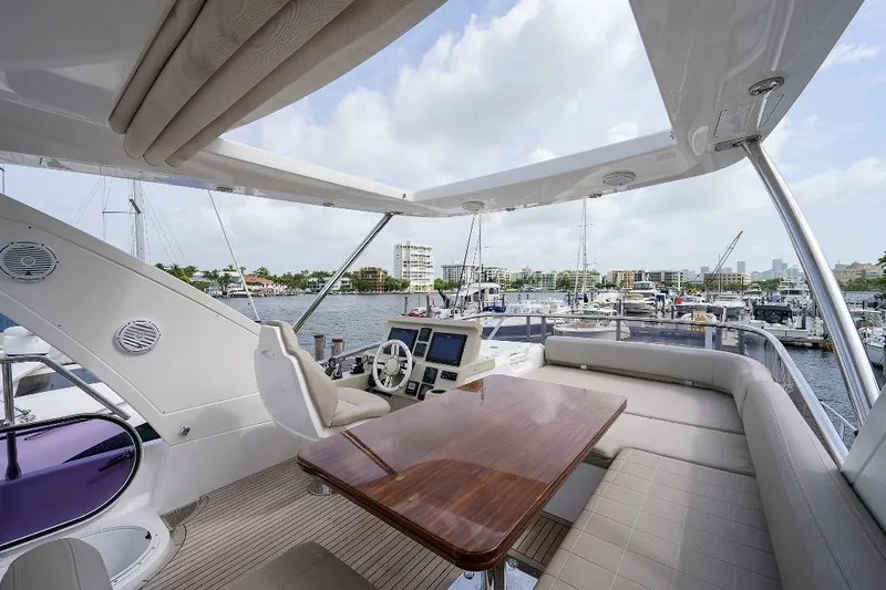 Vivere Yacht Photos Pics Luxurious 2016 Azimut 50 yacht interior with elegant seating and navigation area.