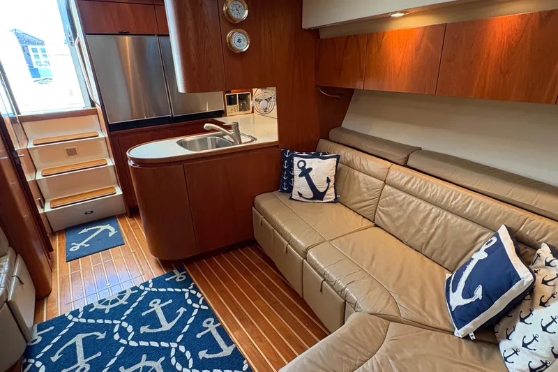 Mokai Yacht Photos Pics Interior of 1996 Tiara 4300 Open yacht with leather seating and nautical decor.