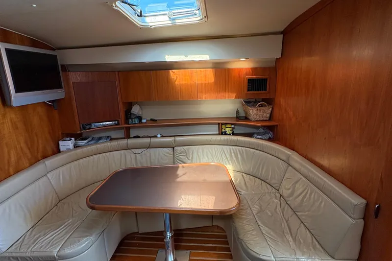 Mokai Yacht Photos Pics Interior of 1996 Tiara 4300 Open yacht with leather seating and wooden finishes.