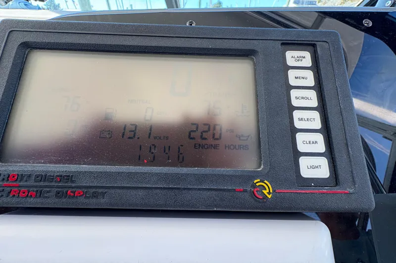 Mokai Yacht Photos Pics Dashboard display of a 1996 Tiara 4300 Open boat showing engine metrics.