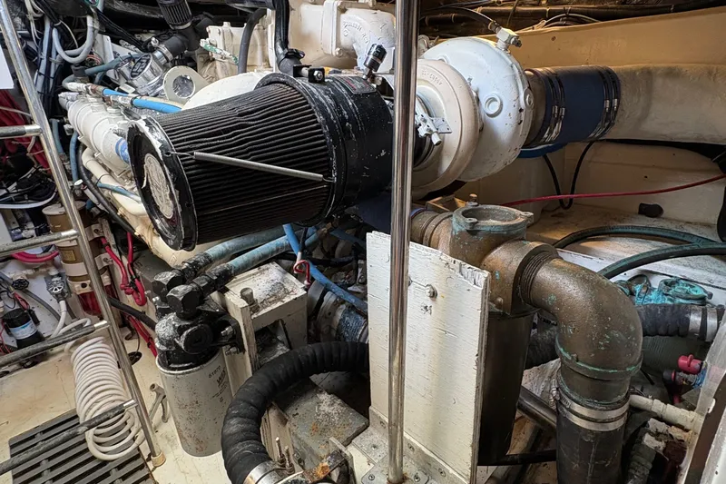 Mokai Yacht Photos Pics Engine room of a 1996 Tiara 4300 Open boat, showcasing mechanical components.