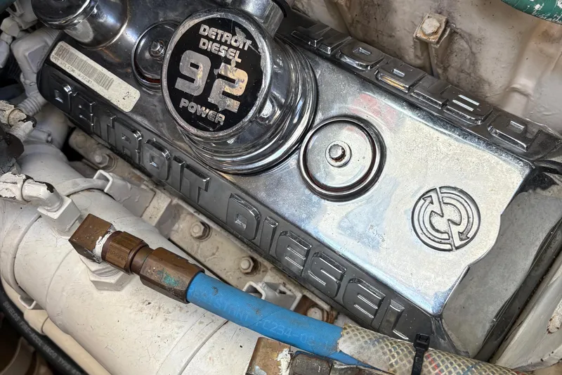 Mokai Yacht Photos Pics Detroit Diesel engine in a 1996 Tiara 4300 Open boat, showcasing chrome details.