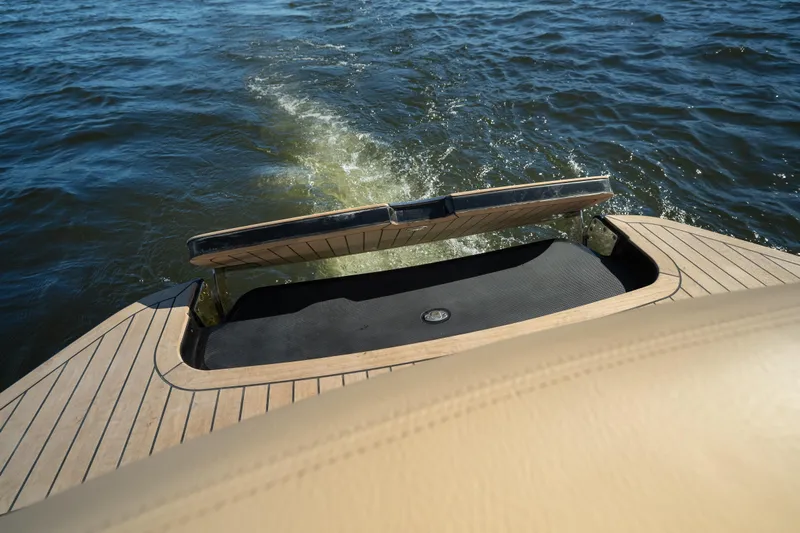  Yacht Photos Pics 2026 Chris-Craft Sportster 28 boat stern on water, showcasing elegant design and craftsmanship.
