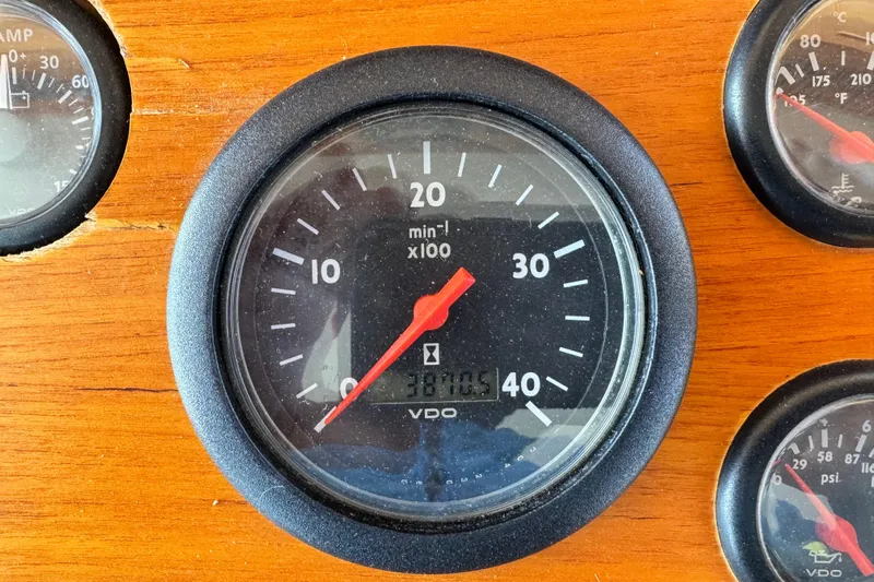 Driftwood Yacht Photos Pics Tachometer on 2000 Grand Banks 52 Europa boat dashboard, showing 3870.5 hours.