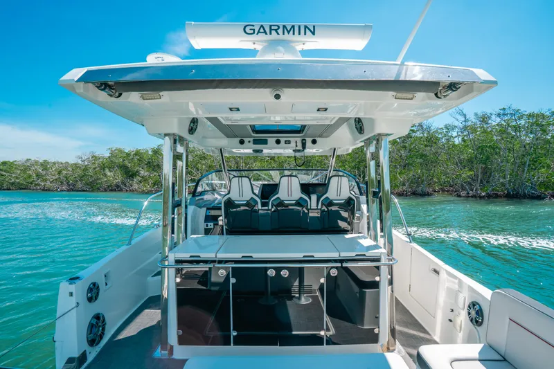  Yacht Photos Pics 2021 Jeanneau Leader 12.5 WA boat with Garmin equipment on a sunny day.