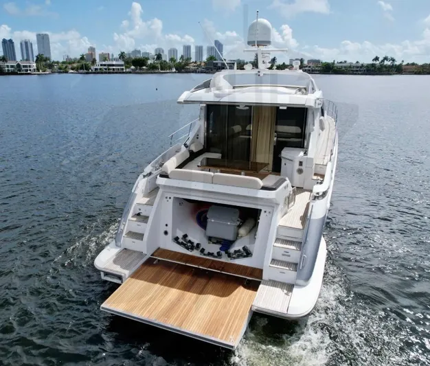 Saint George Yacht Photos Pics 2015 Azimut 55S yacht on water, rear view with open deck.