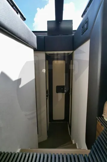 Saint George Yacht Photos Pics Interior stairway of 2015 Azimut 55S yacht, featuring sleek modern design.