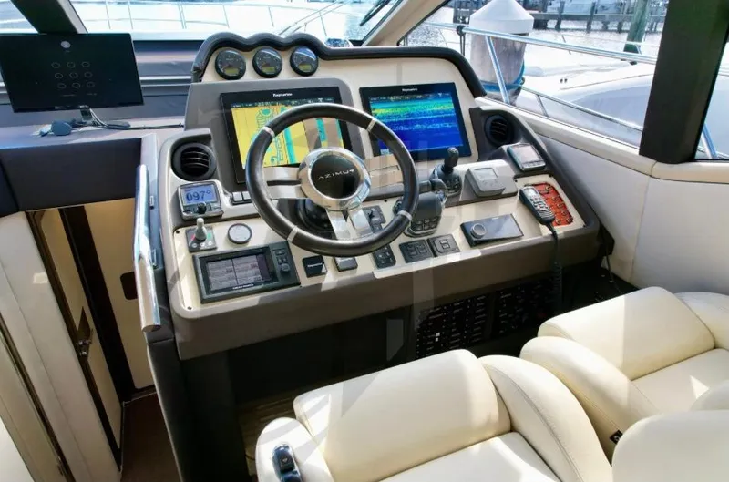 Saint George Yacht Photos Pics Luxurious 2015 Azimut 55S yacht cockpit with advanced navigation controls and plush seating.