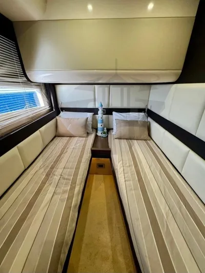 Saint George Yacht Photos Pics Luxurious 2015 Azimut 55S yacht cabin with twin beds and modern decor.